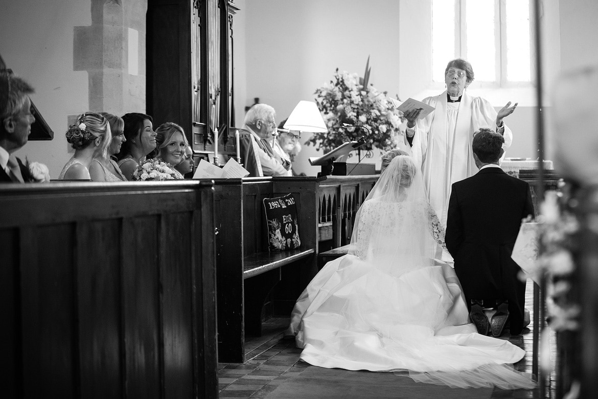 the vicar blesses the couple