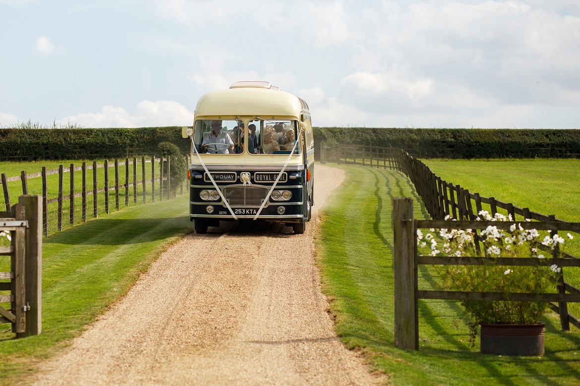 the vintage wedding bus arrives on site