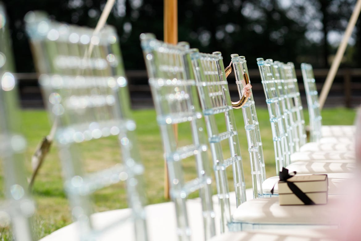 glass backed chairs at the top table