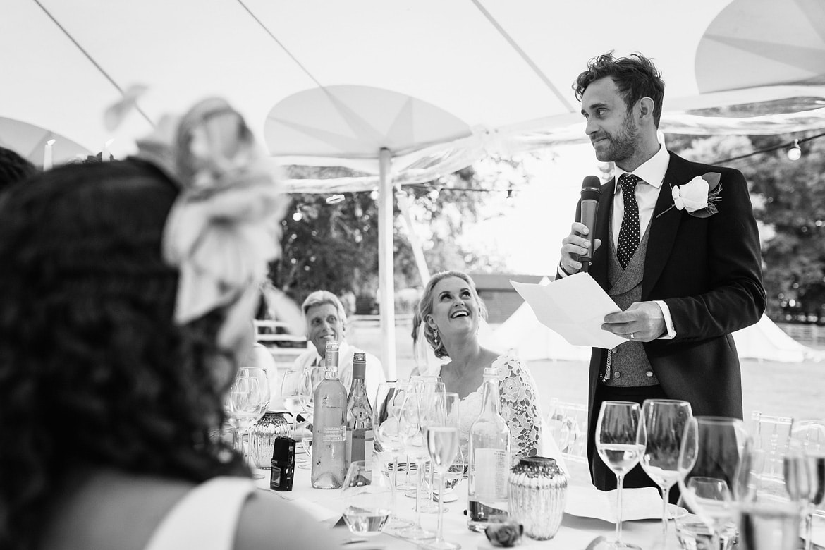 The grooms speech with the bride looking on