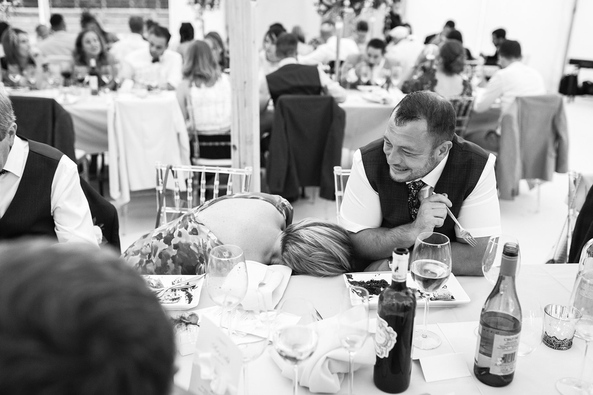 guests laugh during the wedding breakfast