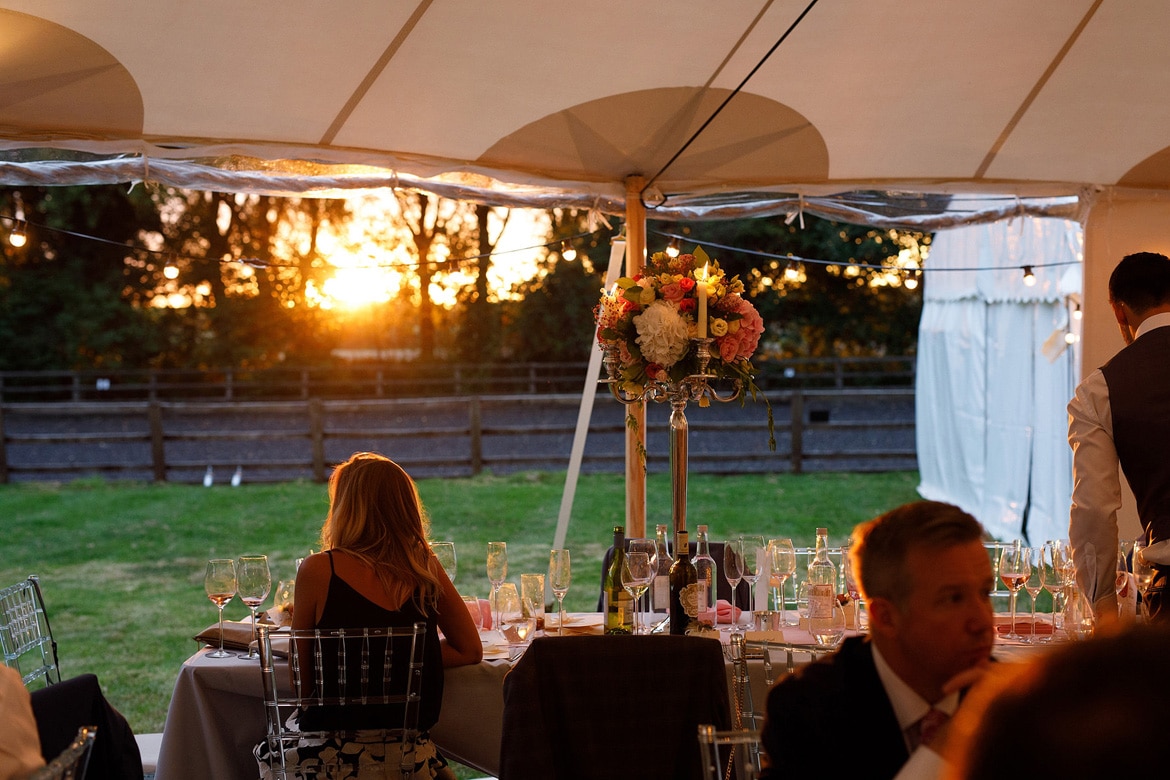 the sun sets outside the sperry tent