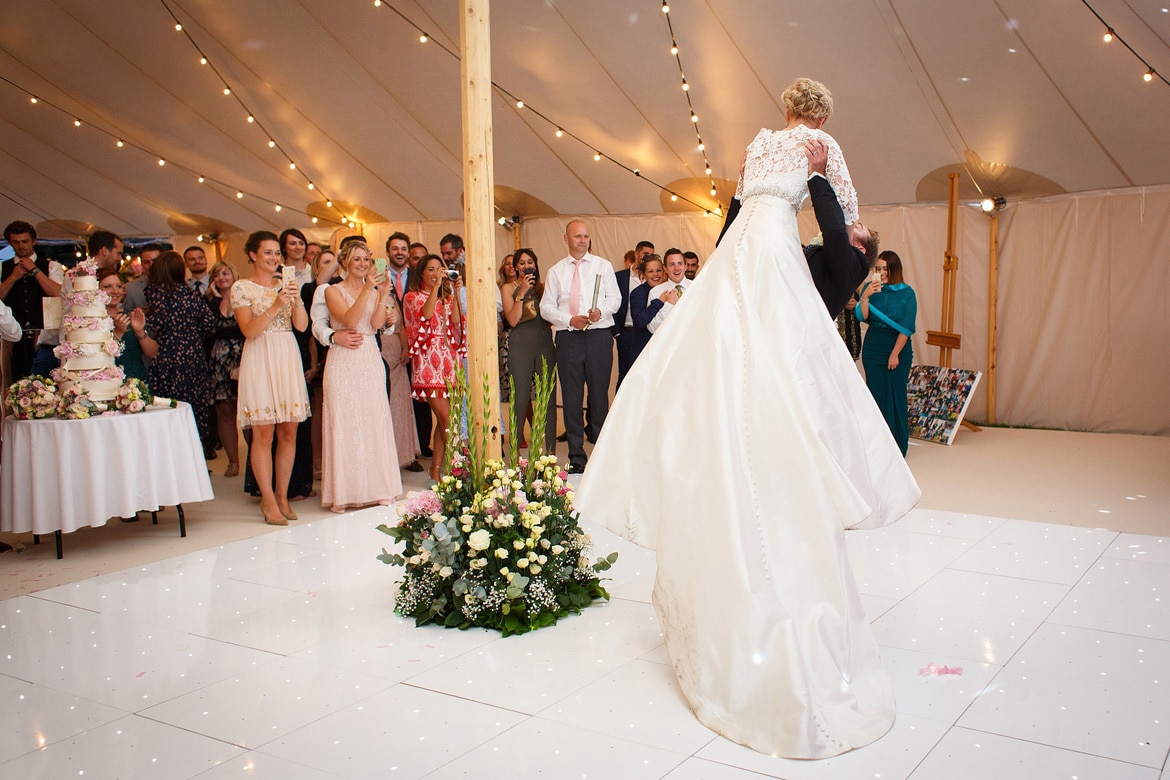 kyle lifts holly up during their first dance