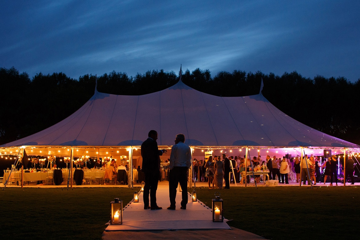 the bride father outside his daughters summer marquee wedding