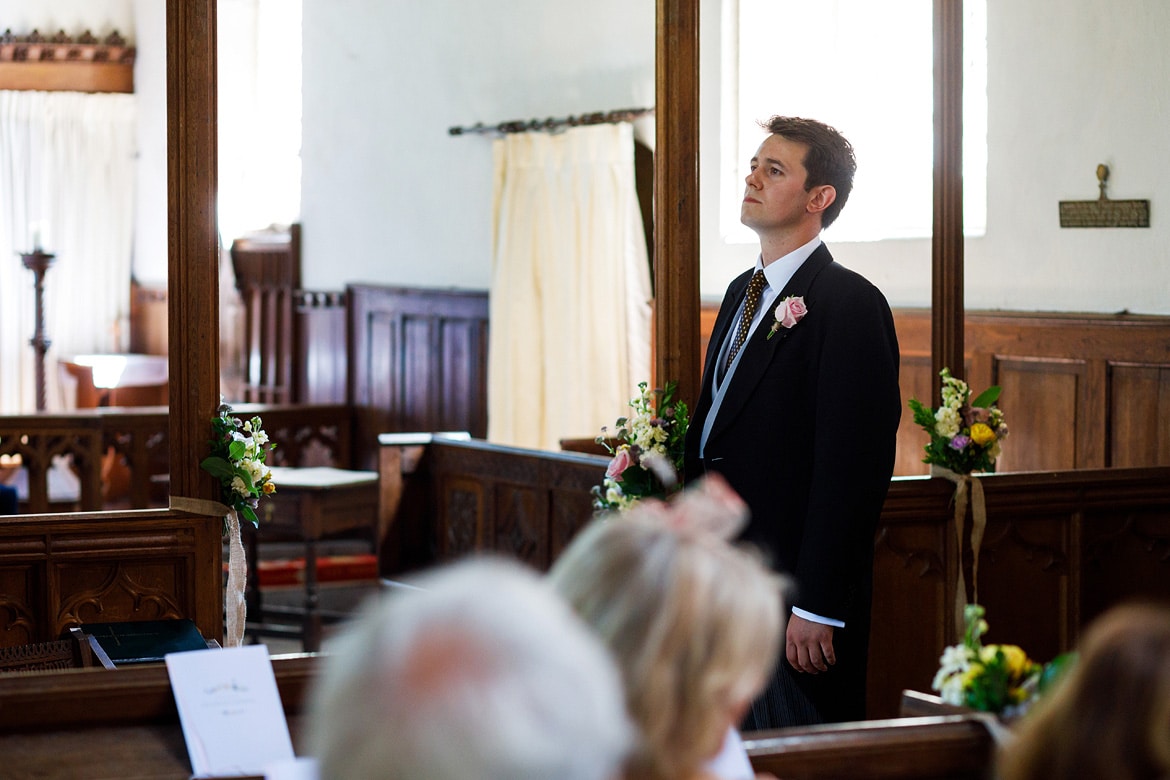 the groom waiting inside pennard church