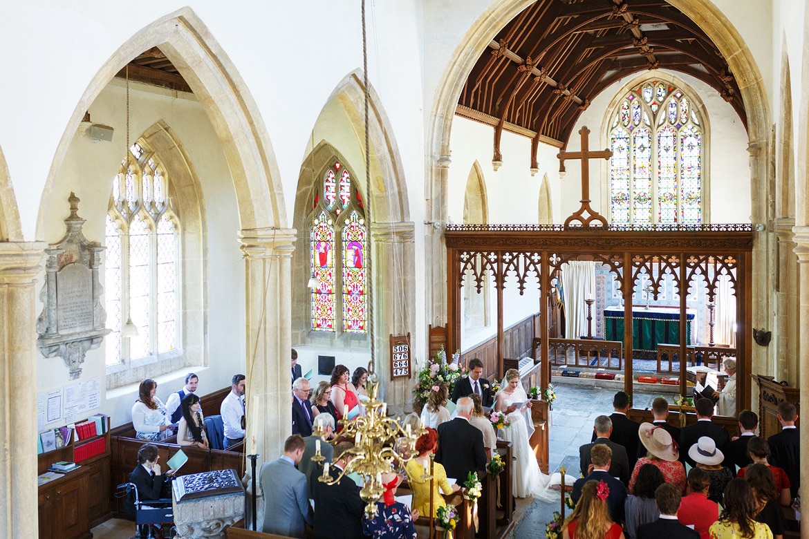 a wedding ceremony inside pennard church