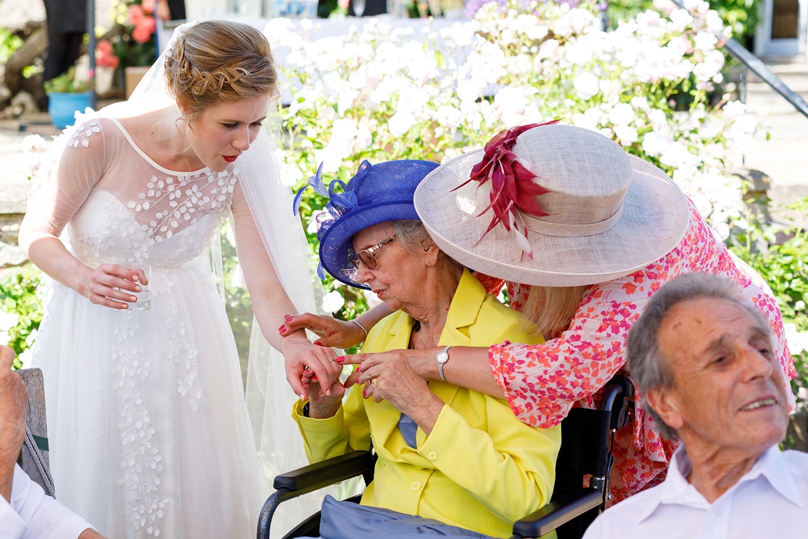 the bride shows off her ring