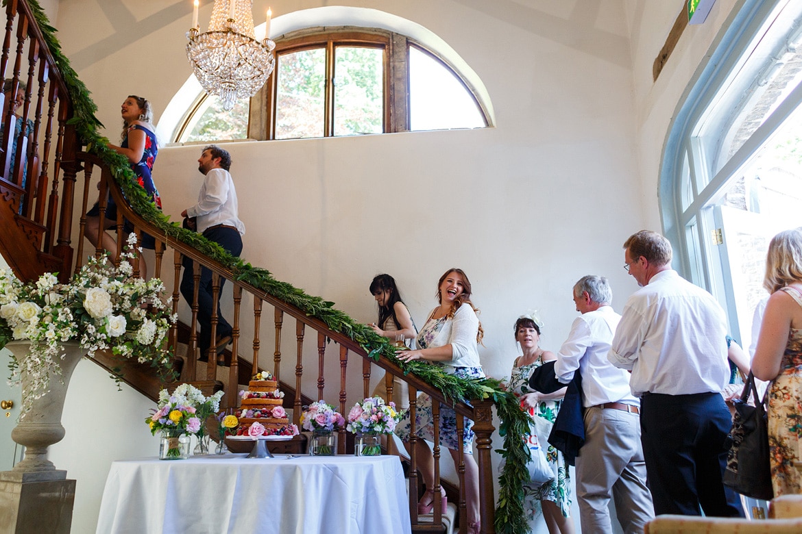 guests enter the coach house for the wedding breakfast