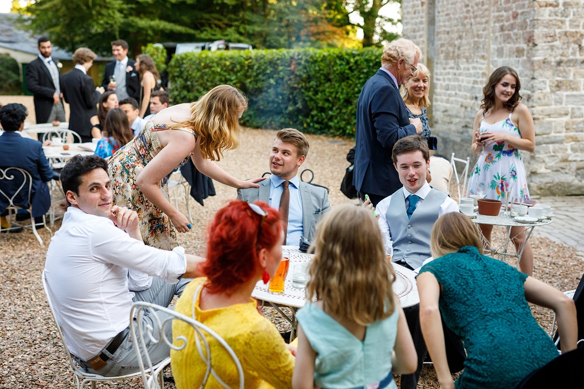 wedding guests outside the coach house