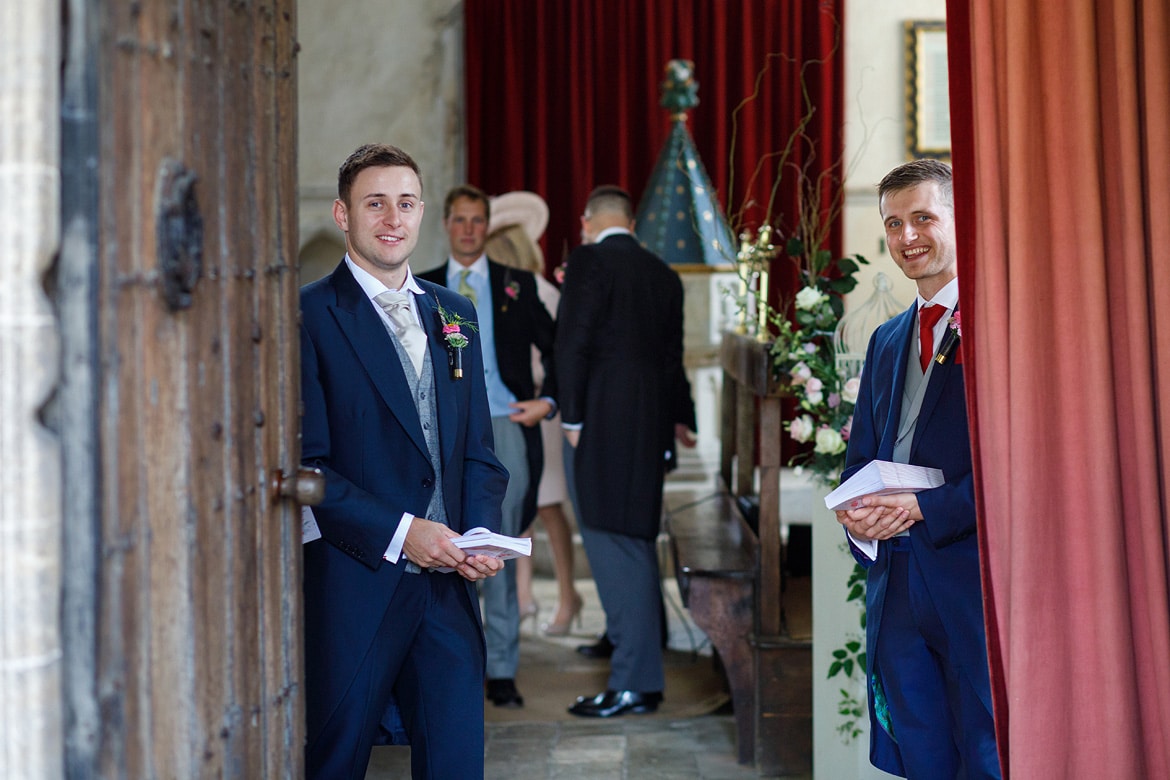 ushers waiting to greet the guests