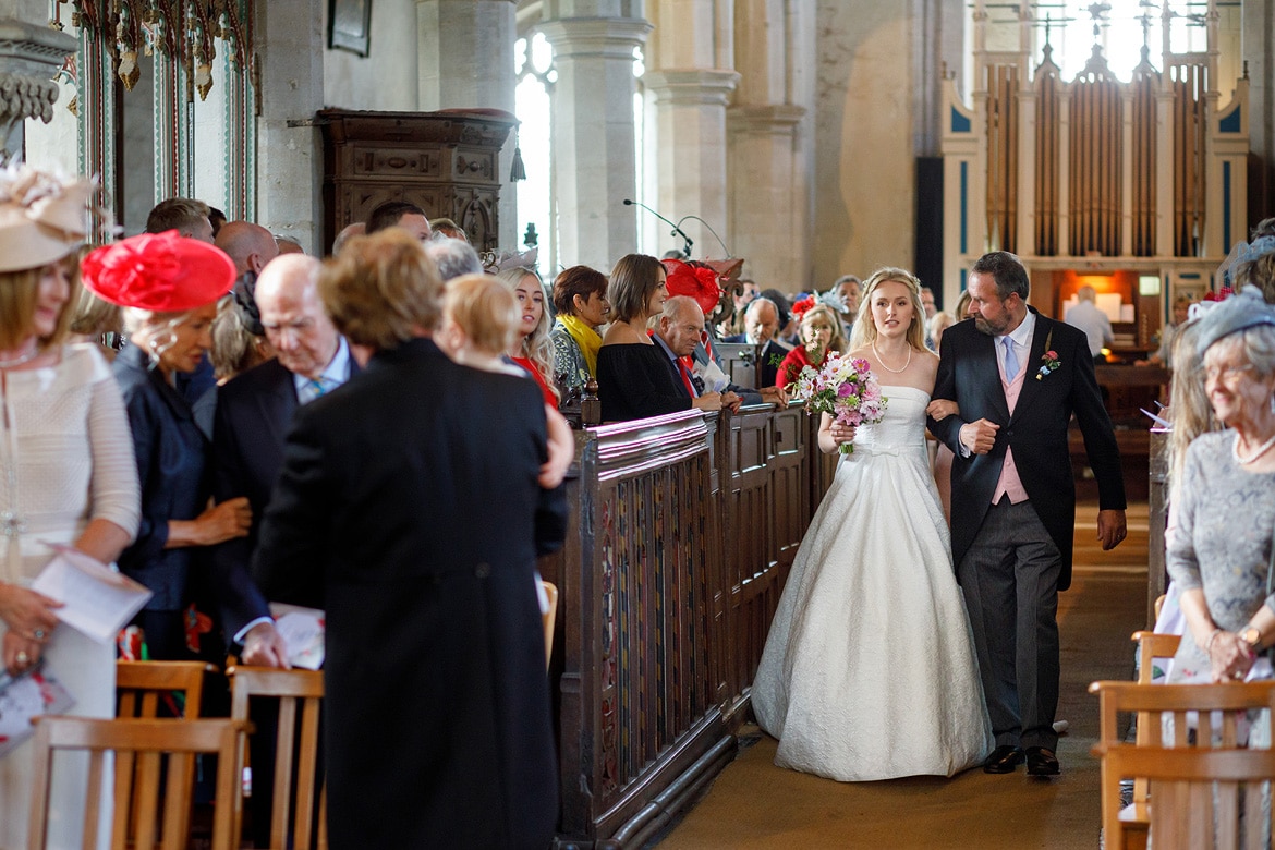 the bride arrives with her father