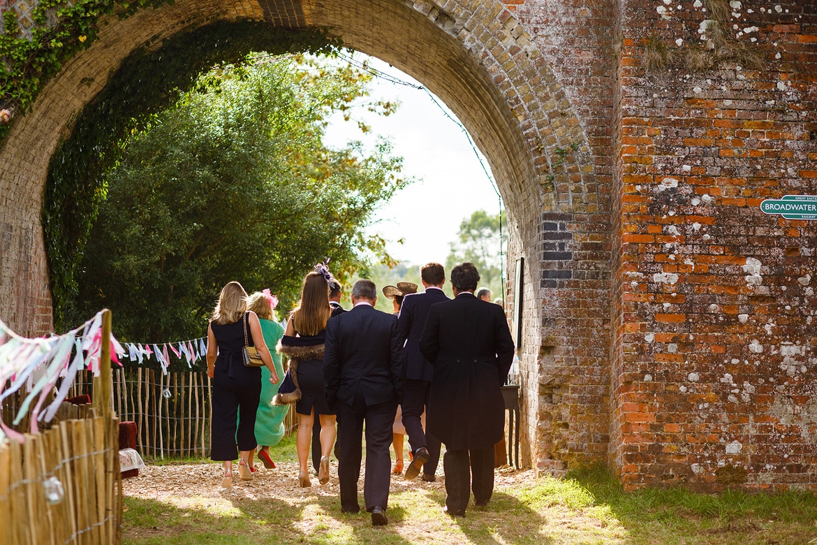 guests arriving under the railway arch