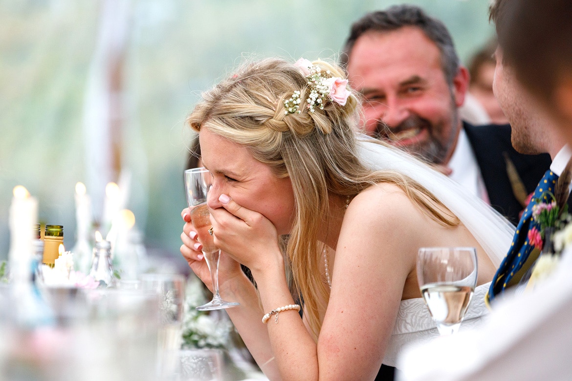 the bride laughs