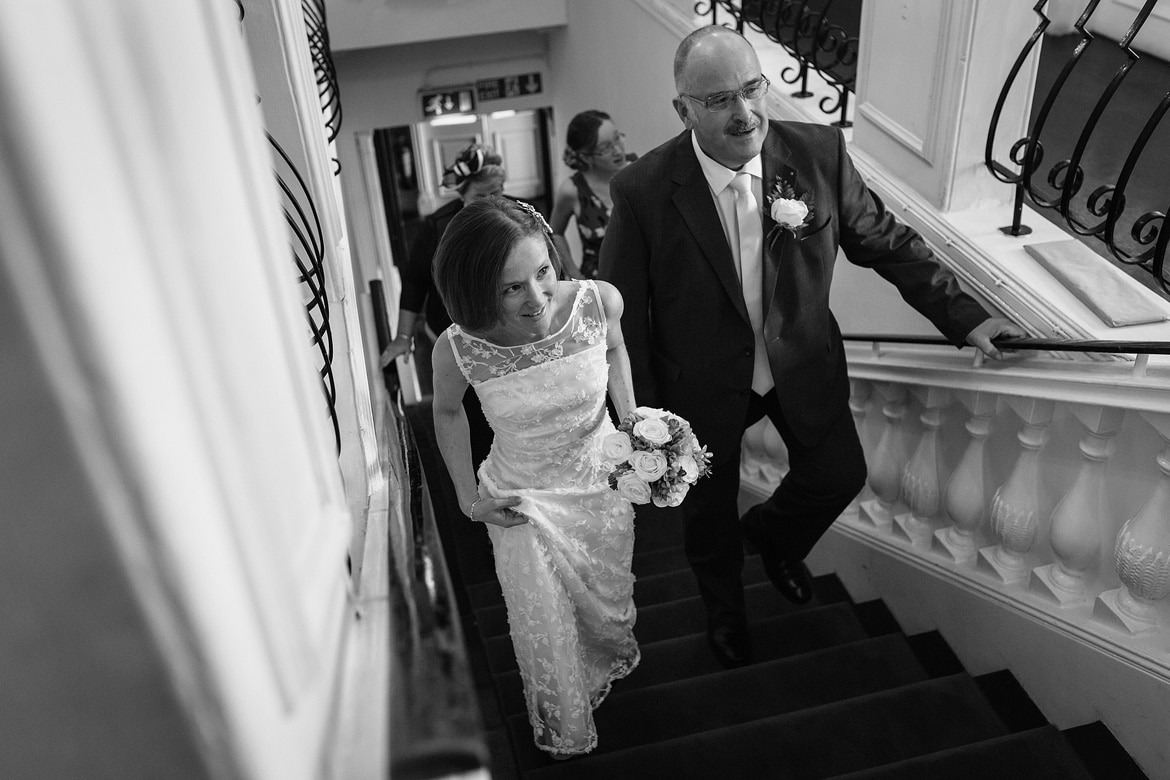 susie and her father walk upstairs