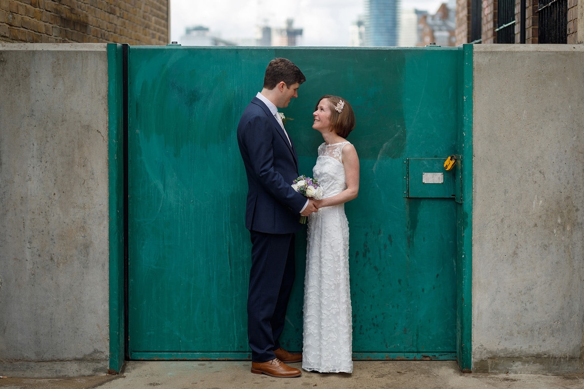 susie and steve in front of a thames floodgate