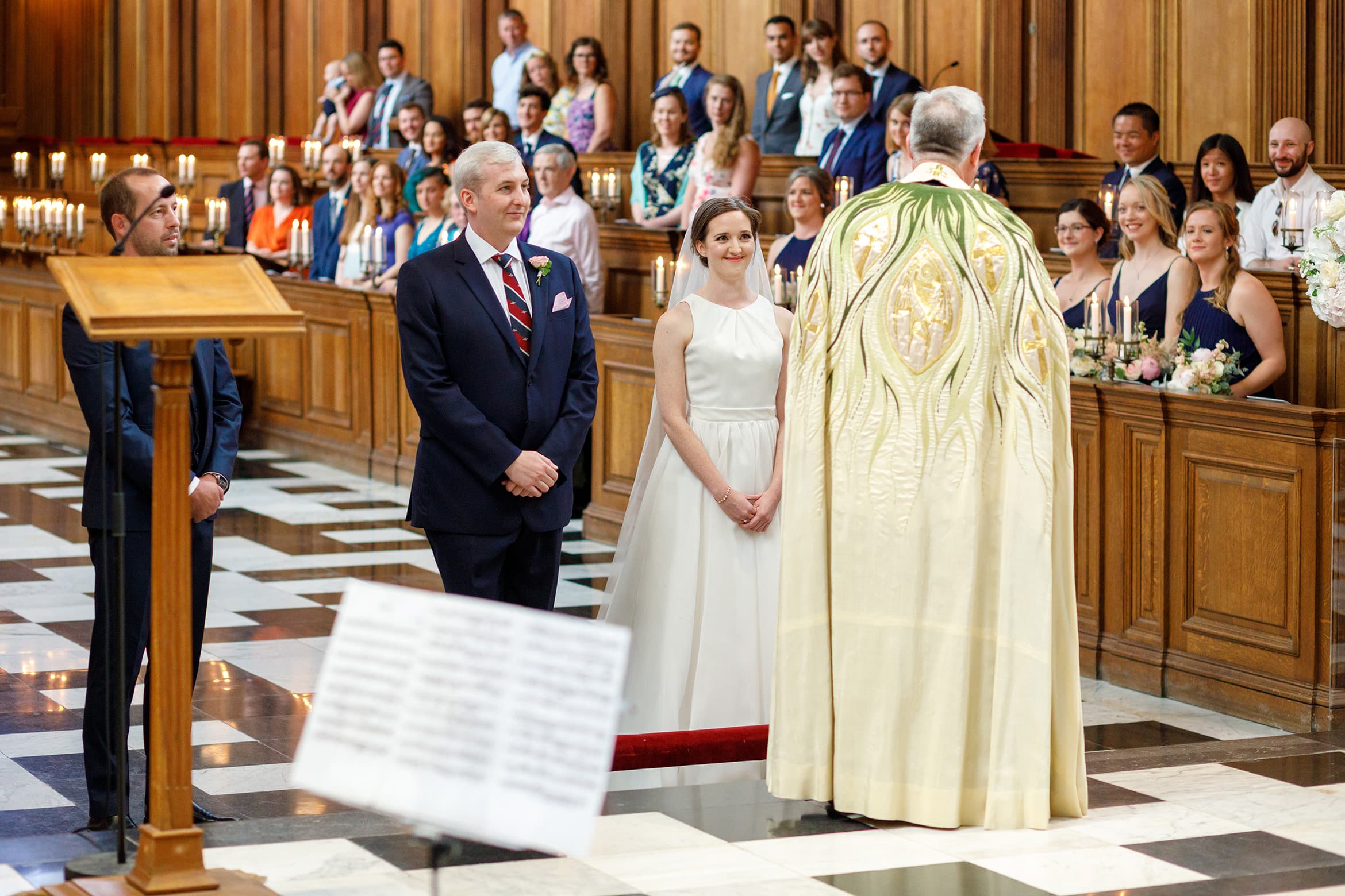 bride and groom at the alter