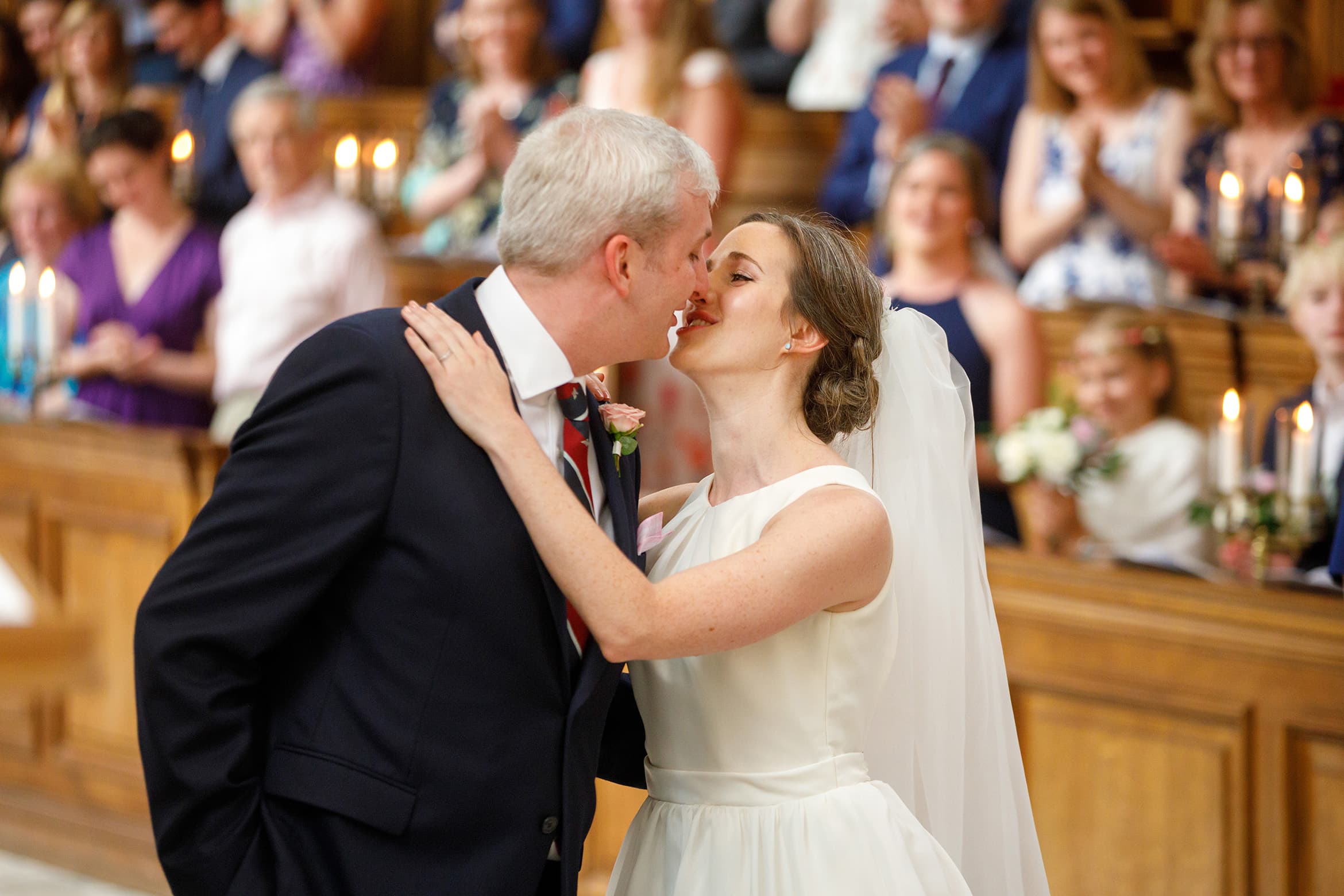 bride and grooms first kiss