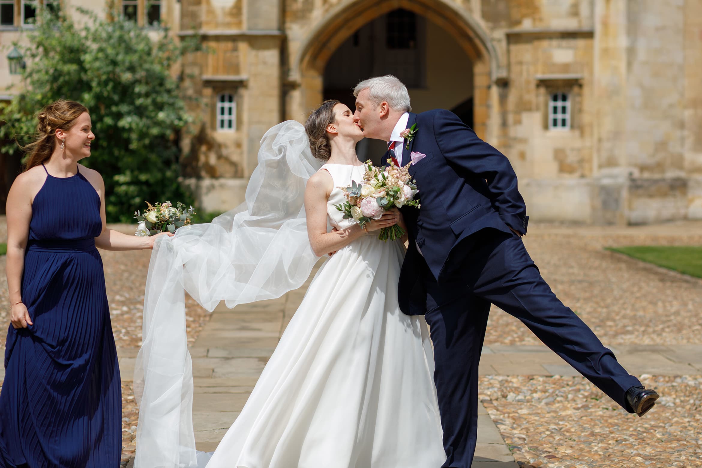 bride and groom kiss