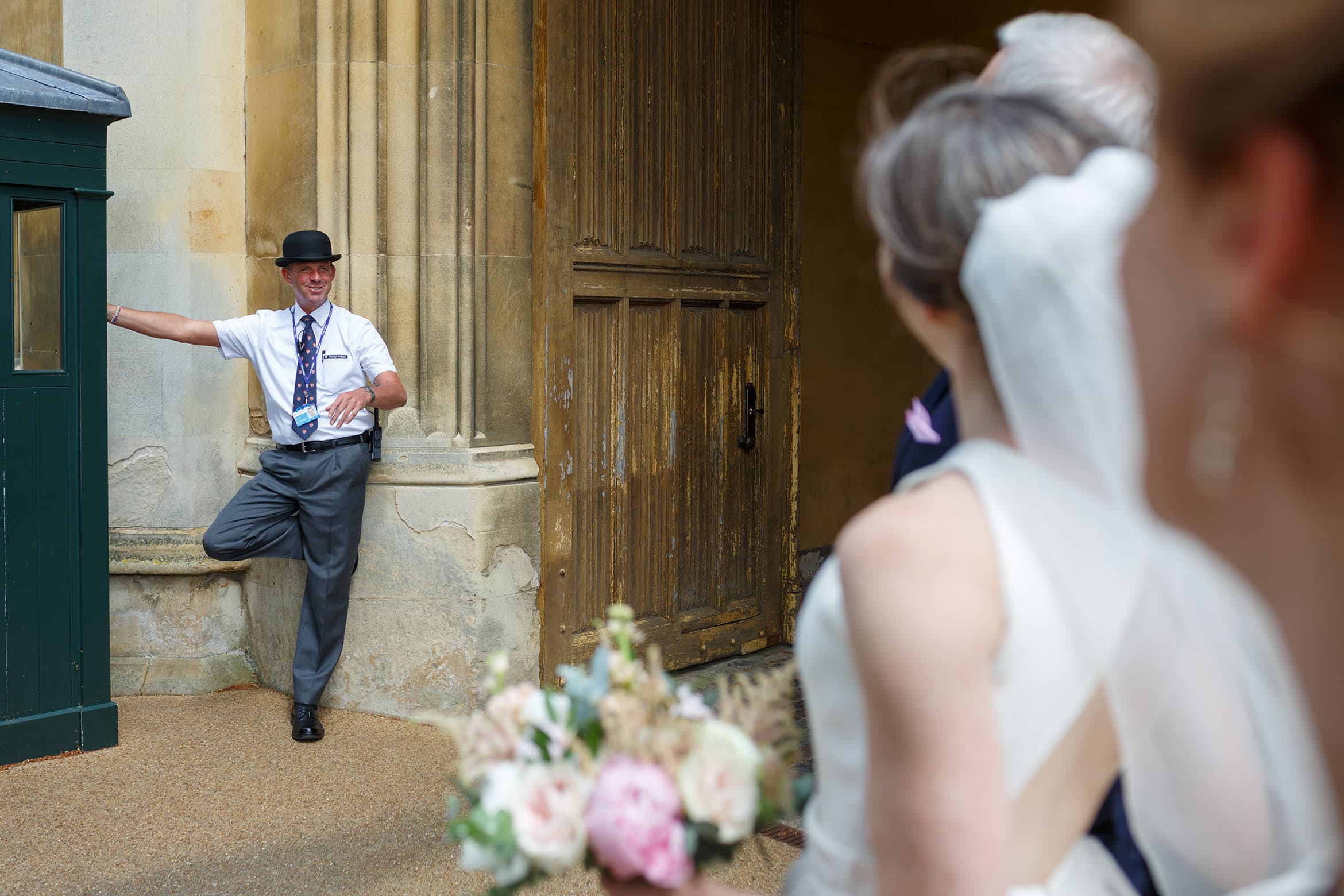 a porter talks to the bride and groom