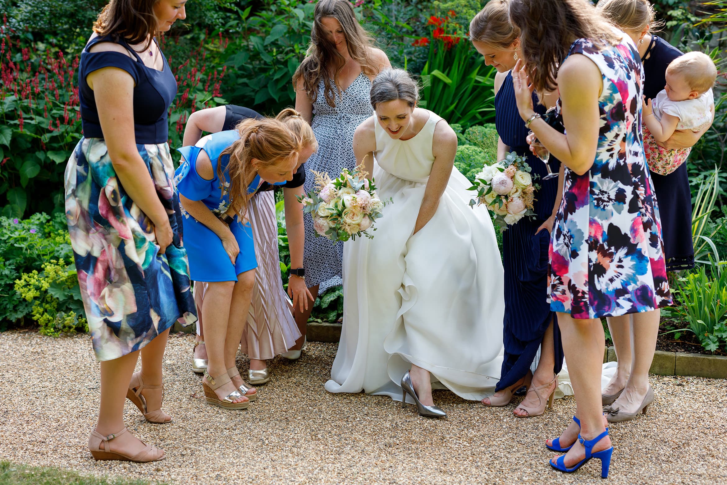 the bride shows off her shoes