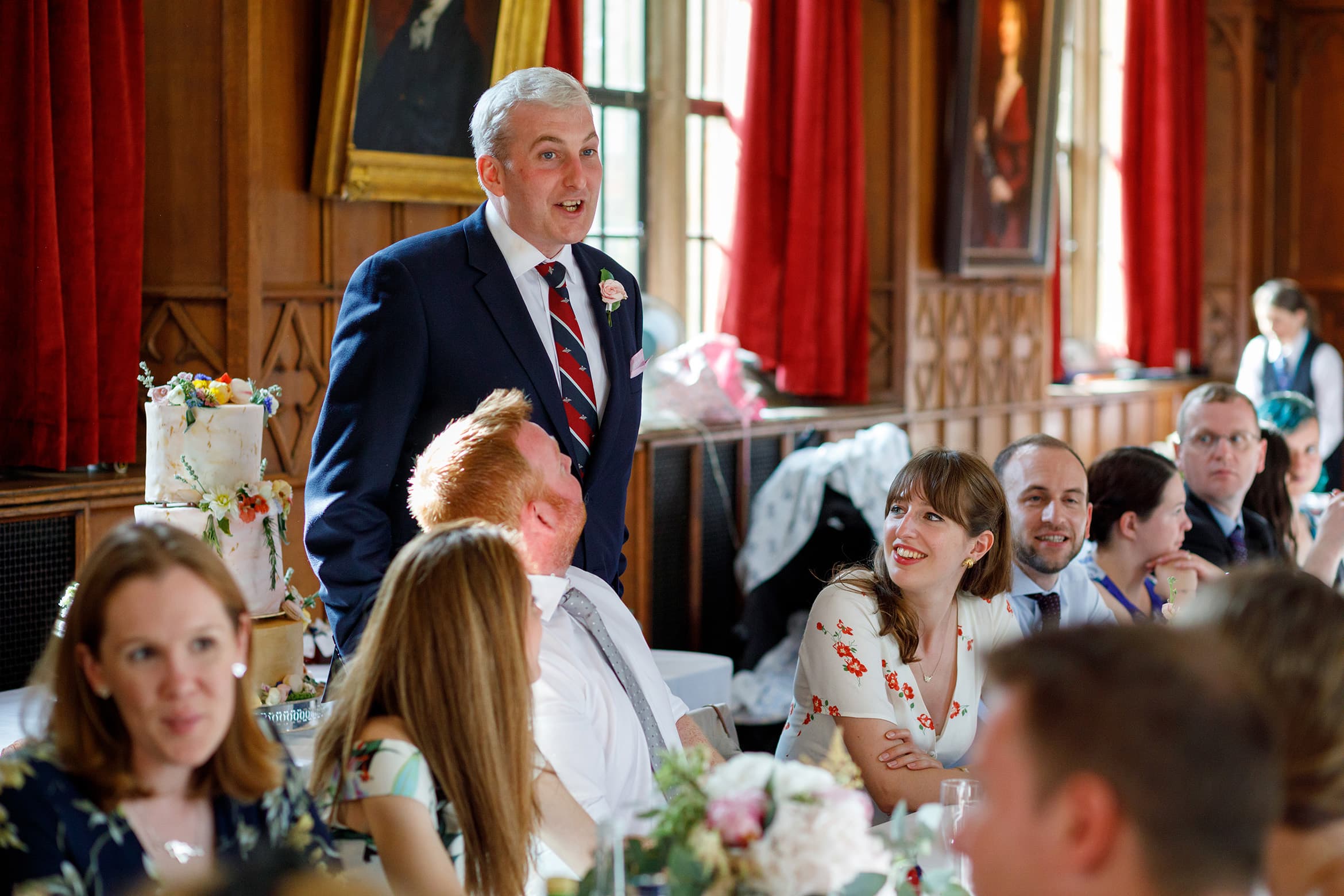 the groom talks to his guests