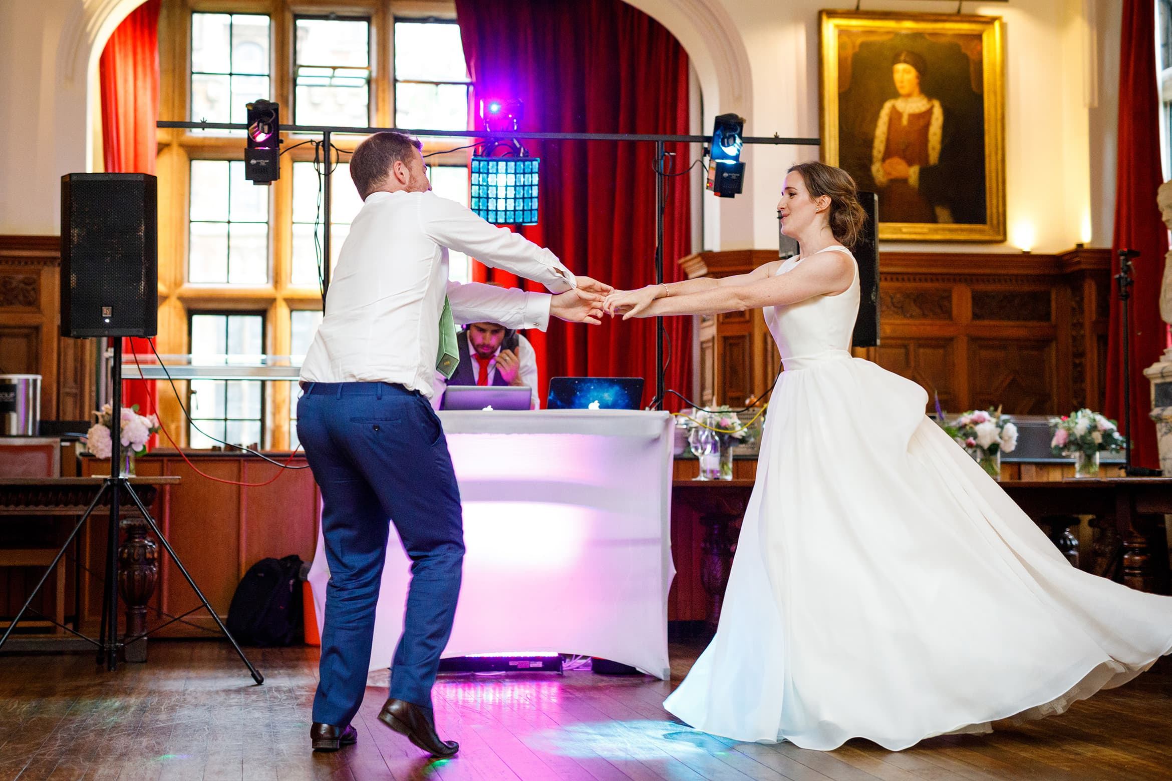 the bride dances with a guest