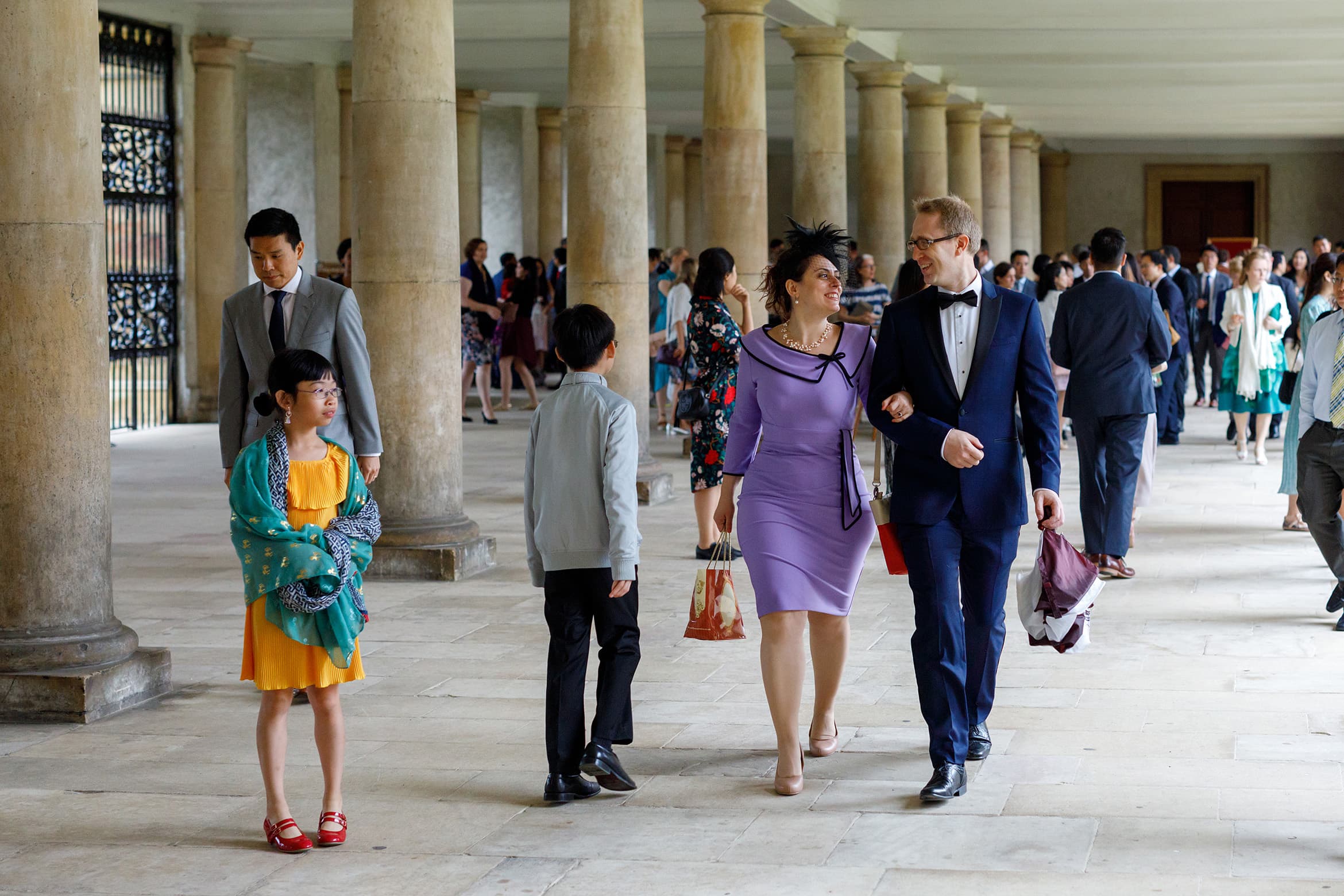 guests walk through the wren cloisters