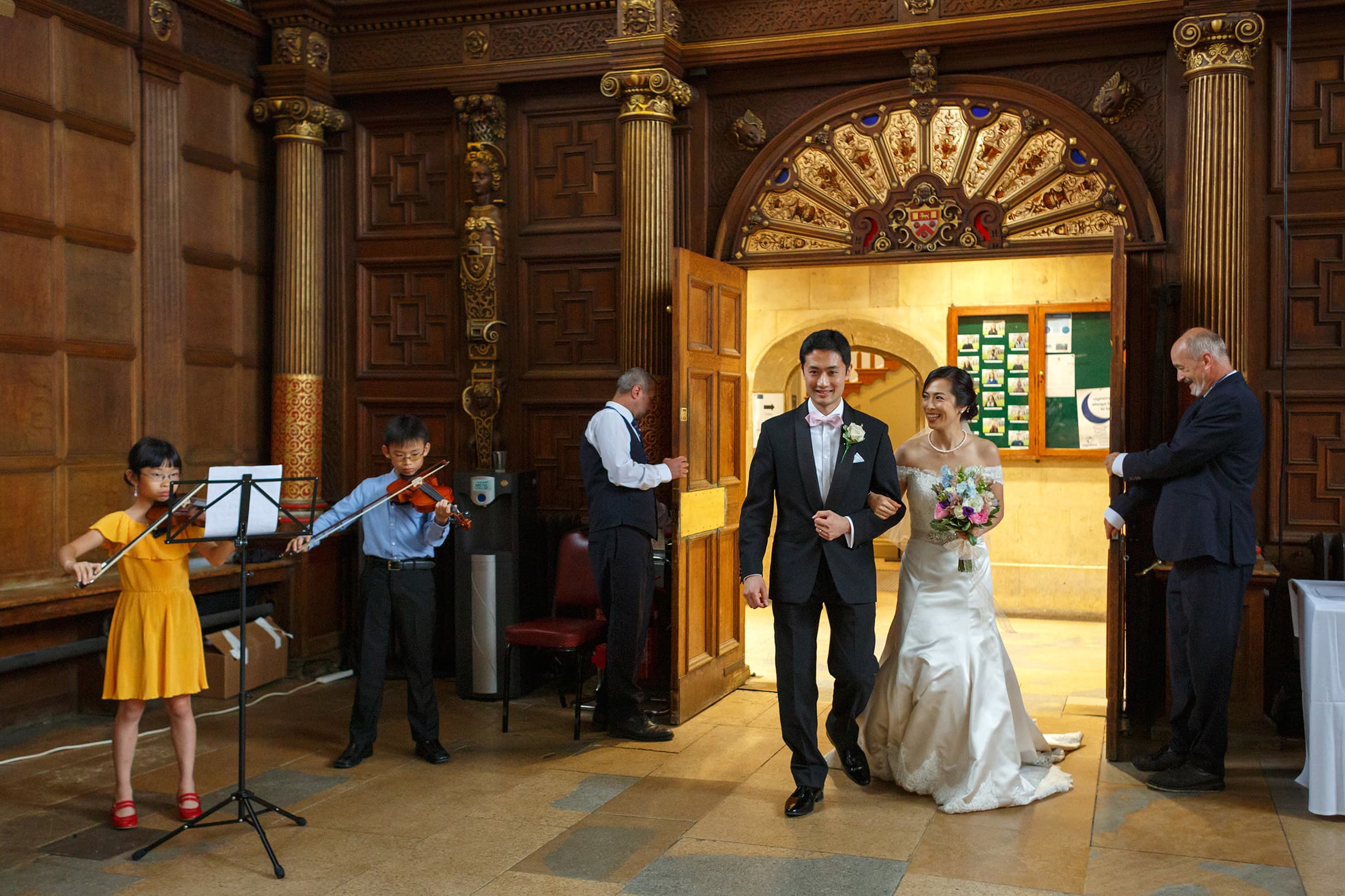 making their entrance into the hall