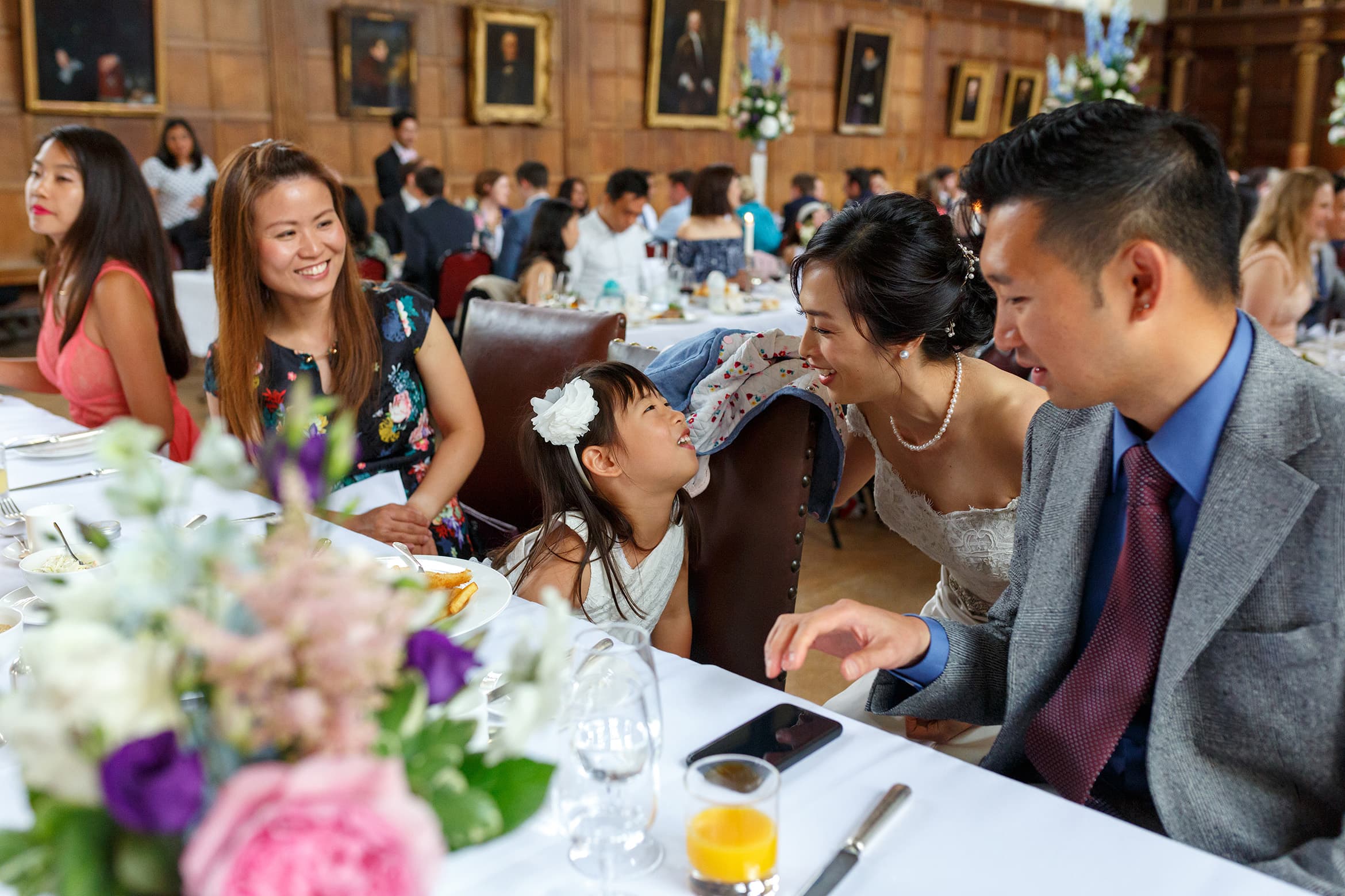 the bride and her guests laugh