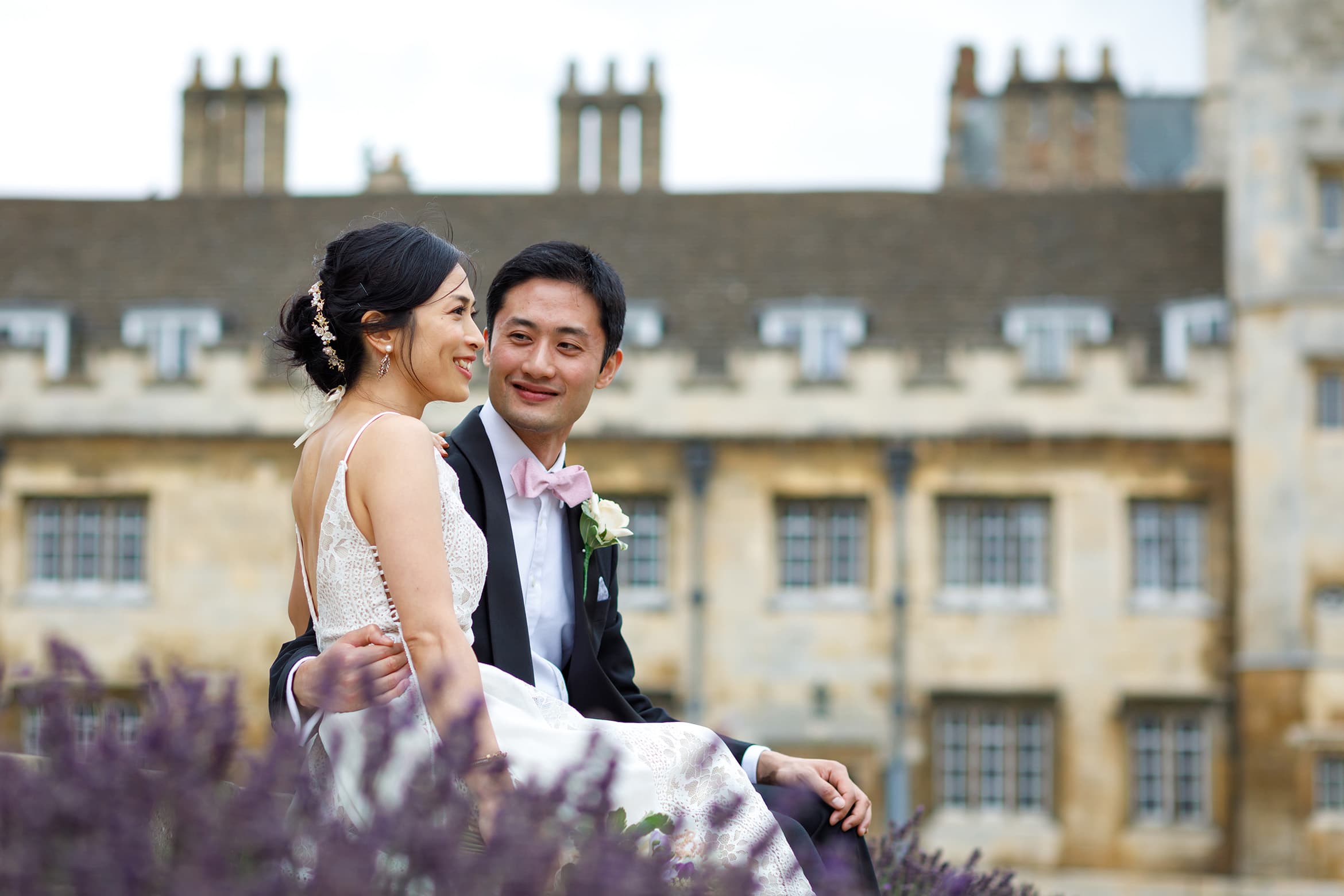 a wedding couple at trinity college cambridge