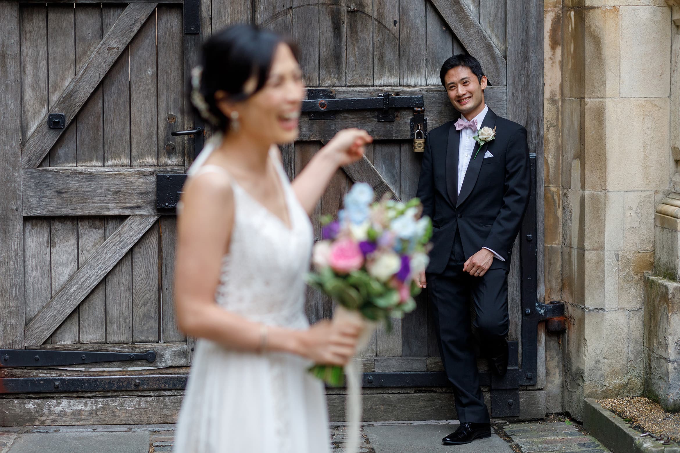 the bride laughs at the groom